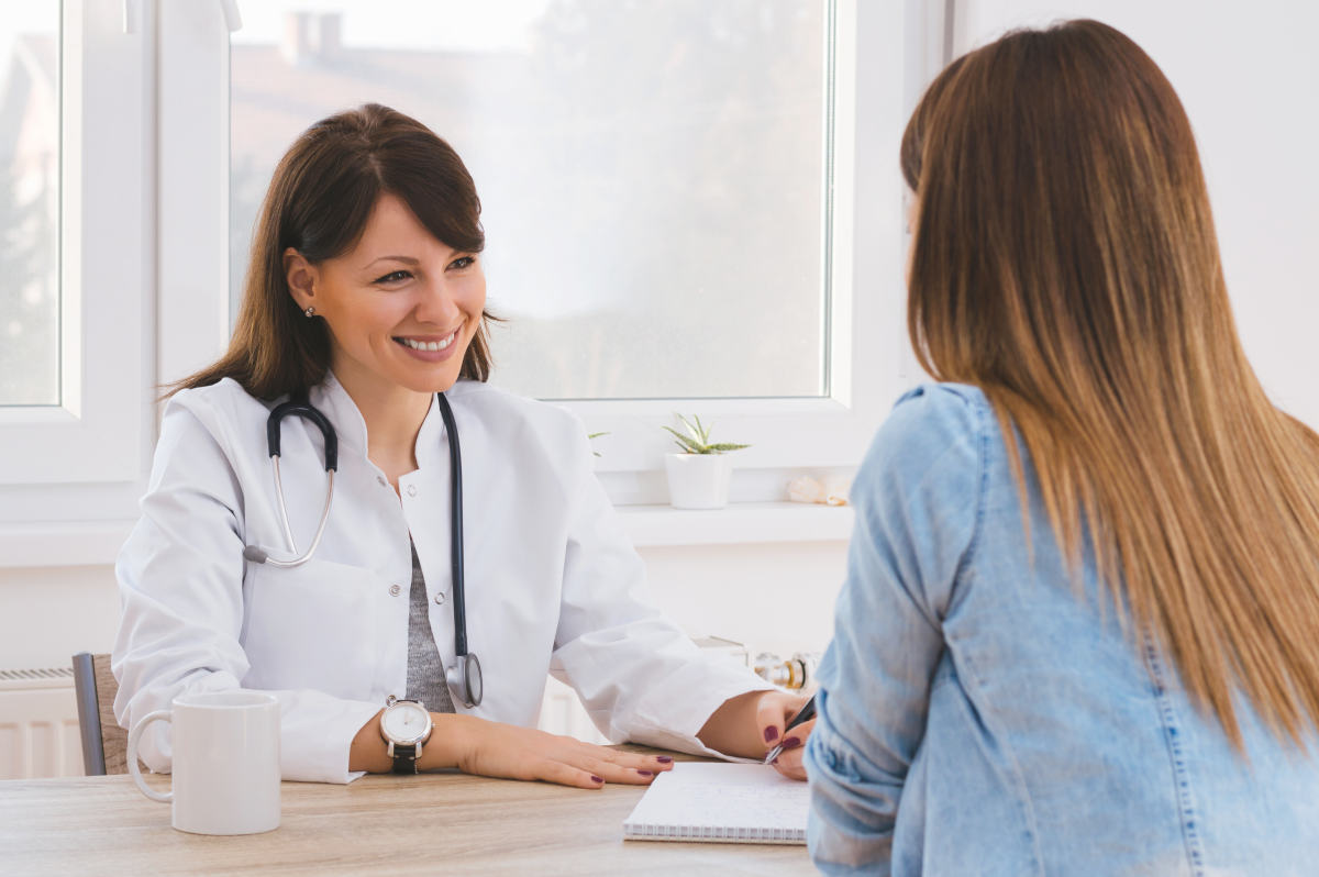 Patient Having Consultation With Female Doctor In Office | Premenopause | Perimenopause Symptoms and What To Expect
