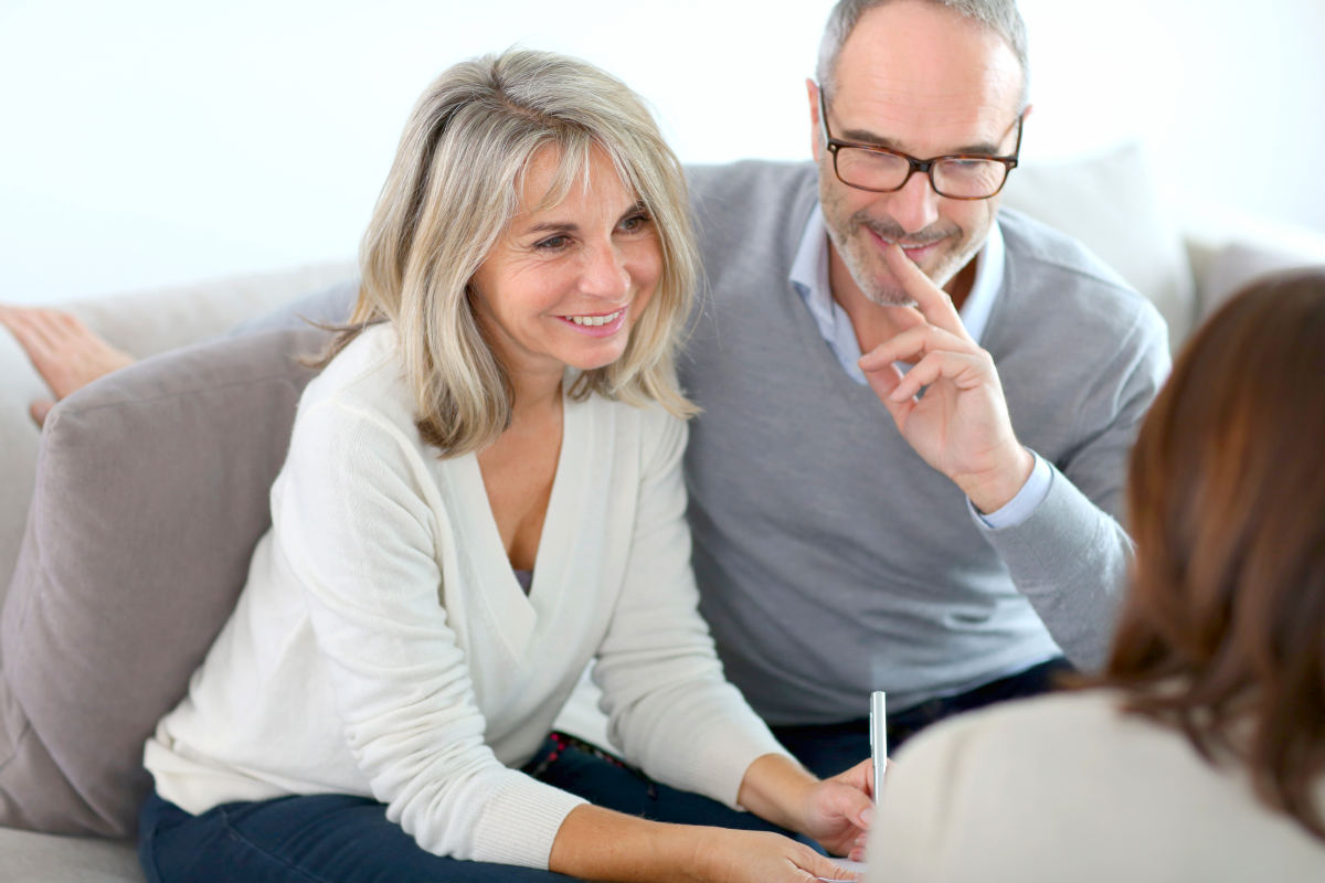 Senior couple meeting financial adviser for investment | More Sex Can Prevent Heart Attacks, According To Science