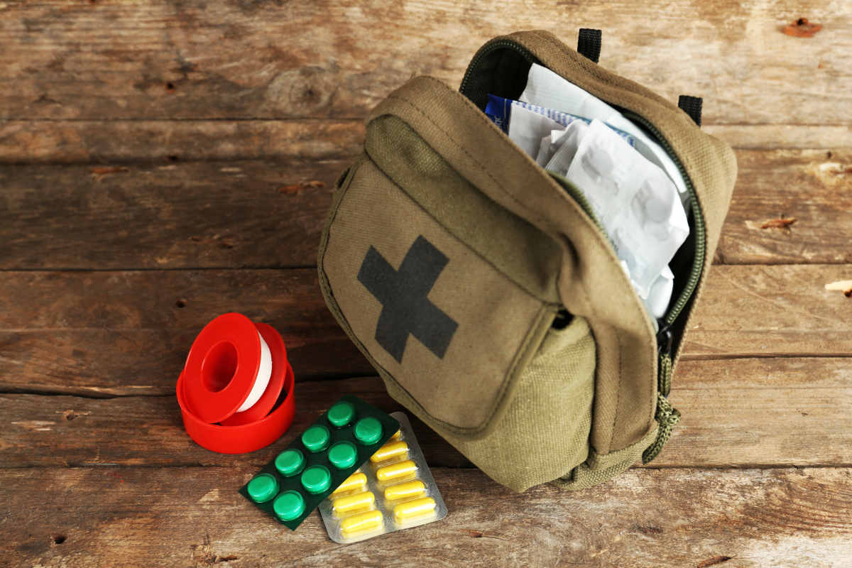 Medicine chest on wooden background | Hiking First Aid Kit | What To Bring On The Trail In Case Of Emergency | backpacking first aid kit