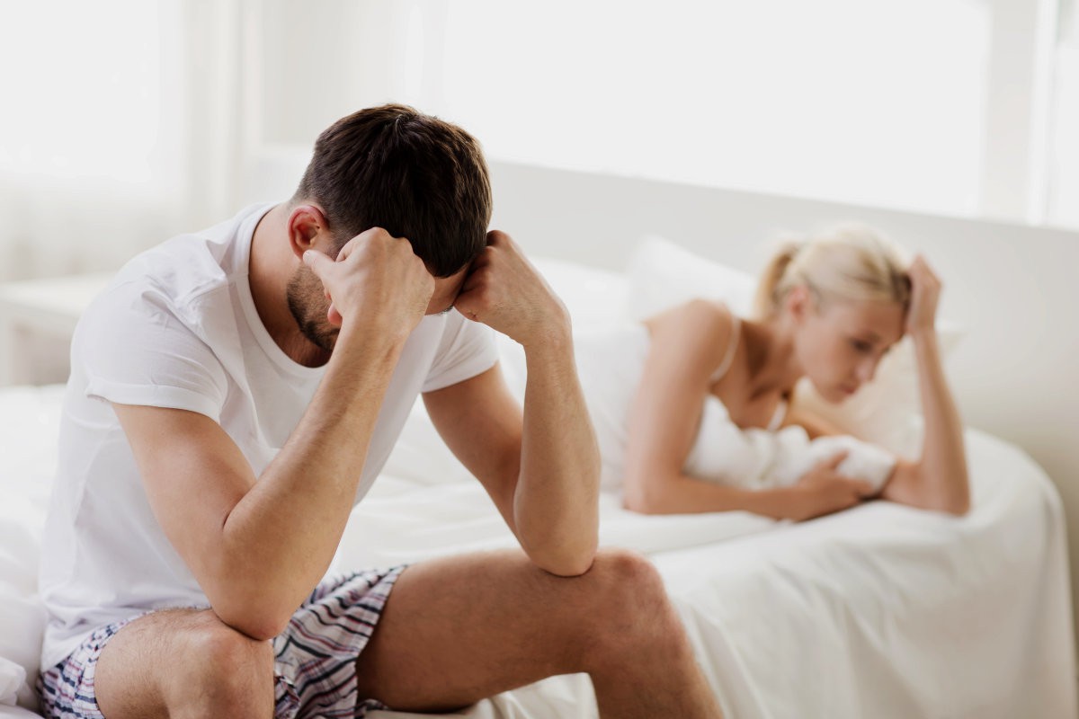 Unhappy couple having problems at bedroom | What Are The Symptoms of Hormonal Imbalance? | health and well-being