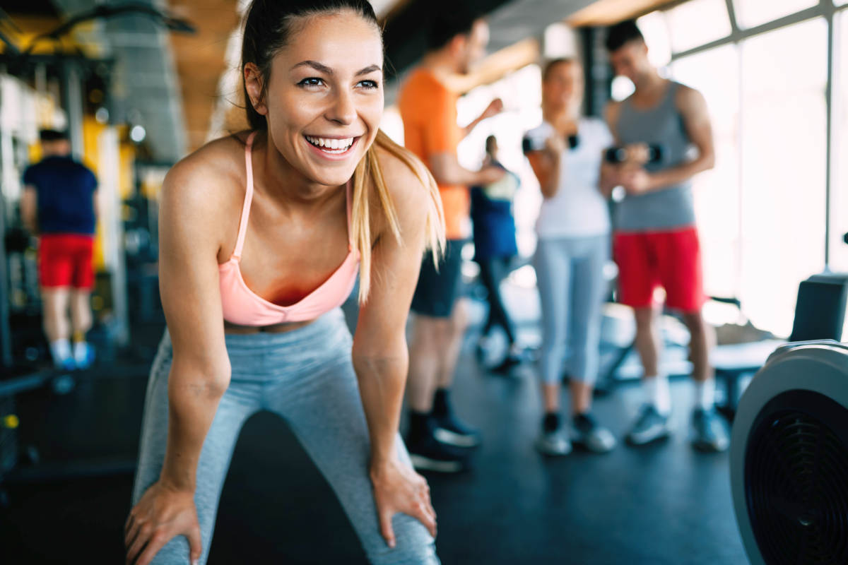 Close up image of attractive fit woman in gym | Growth Hormone Deficiency in Adults: Causes, Symptoms, and Treatment | growth hormone deficiency treatment