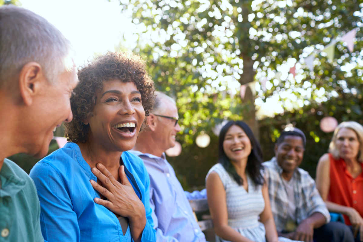 Group Of Mature Friends Socializing In Backyard Together | Normal Testosterone Levels in Men and Women By Age | testosterone in women | average testosterone levels
