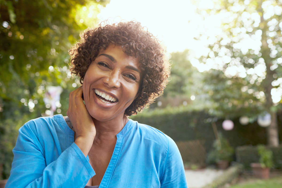 Mature Woman In Back Yard Garden | How To Lower Estrogen Naturally | how to lower estrogen in women