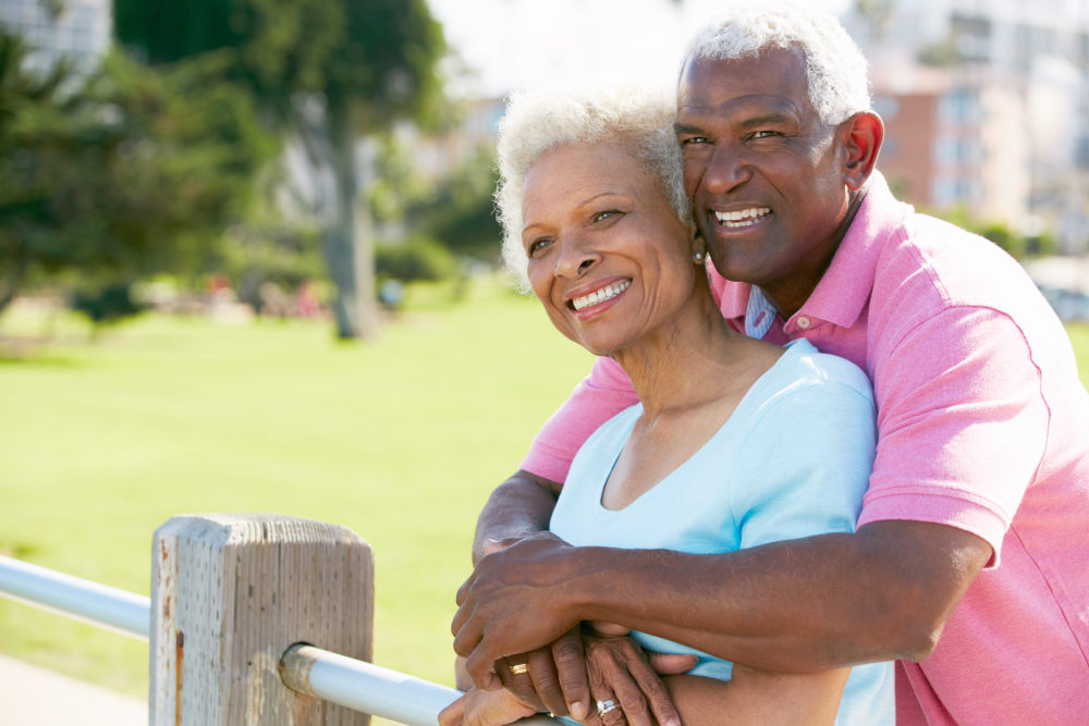 Senior Couple Walking In Park Together | Menopause And Sex: How To Have Better Sex After Menopause | hormone replacement therapy