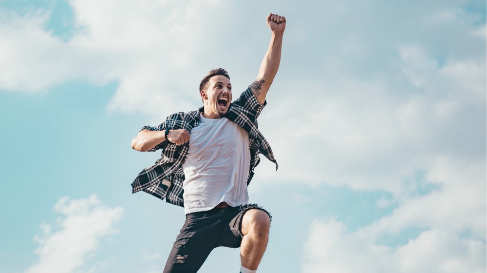 man jumping from a rock | What Is NAD+ And Why It Matters For Your Health | What Is NAD+ | NAD+ structure