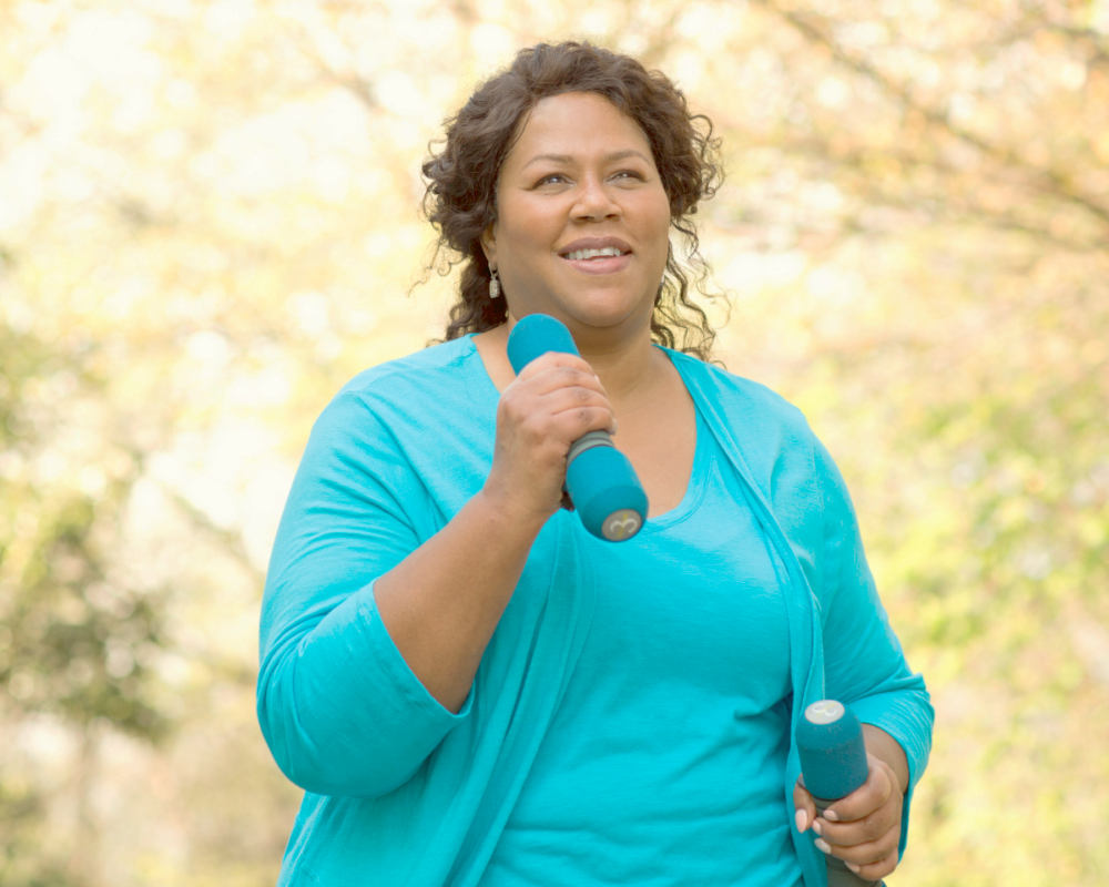 Mature African American woman smiling | Aging Process In A Woman's Body | cellular compartments