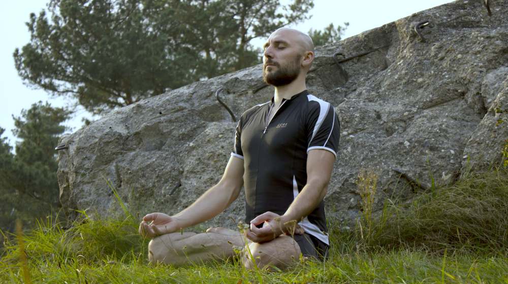 man silently meditating | Brain Fog: Top Causes, Symptoms and Treatment | brain fog | physical and mental fatigue
