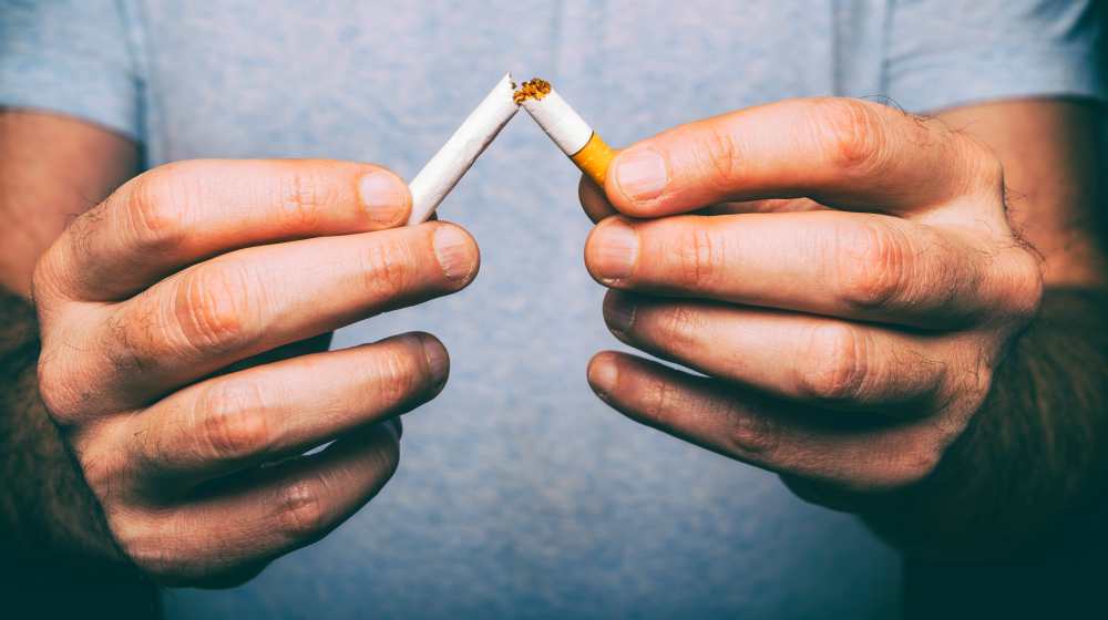 male trying to quit smoking | Hyperthyroidism Diet: Foods To Ease Symptoms | hyperthyroidism diet | hyperthyroidism foods to avoid