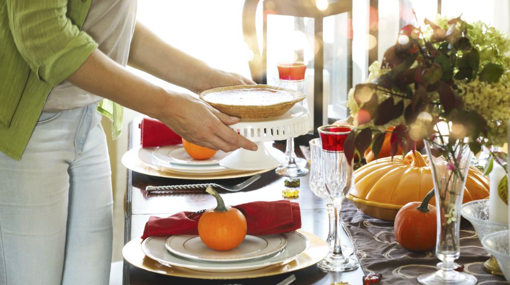 woman serving pumpkin pie at the | Low Thyroid Diet Recipes And Diet Tips | Hypothyroid Diet Plan | low thyroid diet | foods to eat with hypothyroidism