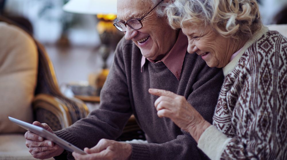 old couple using tablet at home | Ways Telehealth Can Reduce Hospital Readmissions | hospital readmission | readmission rates