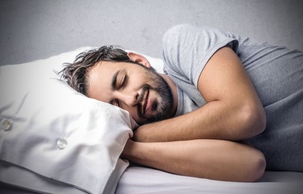 a man sleeping with his hands put under pilows | Sleep Well | 5 Tips To Have More Energy and Better Mood At Any Age